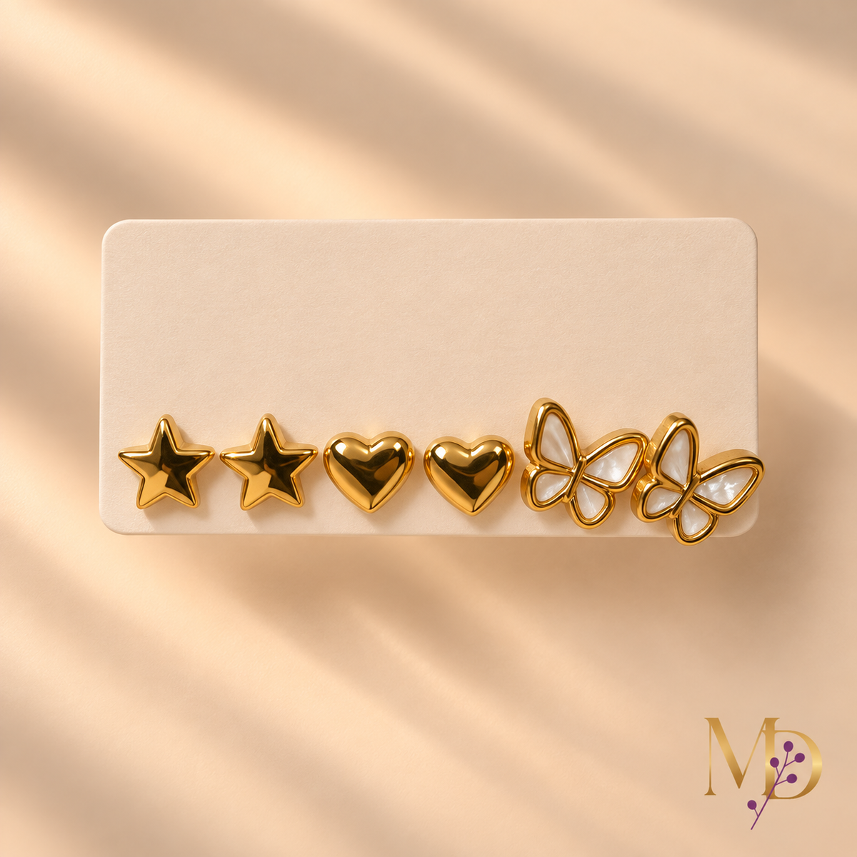 E017 - Golden Charm Trio Earrings